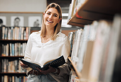 Buy stock photo Student, reading or books in library on school, university or college campus for education, study research or learning. Portrait, smile or happy woman, textbook or bookshelf information for homework