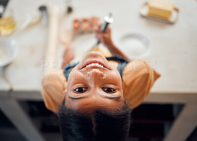 Buy stock photo Cooking, kitchen and face portrait of kid baking dessert, food or prepare ingredients, egg or recipe. Youth child development, top view and happy African girl learning to bake cake, cookie or cupcake