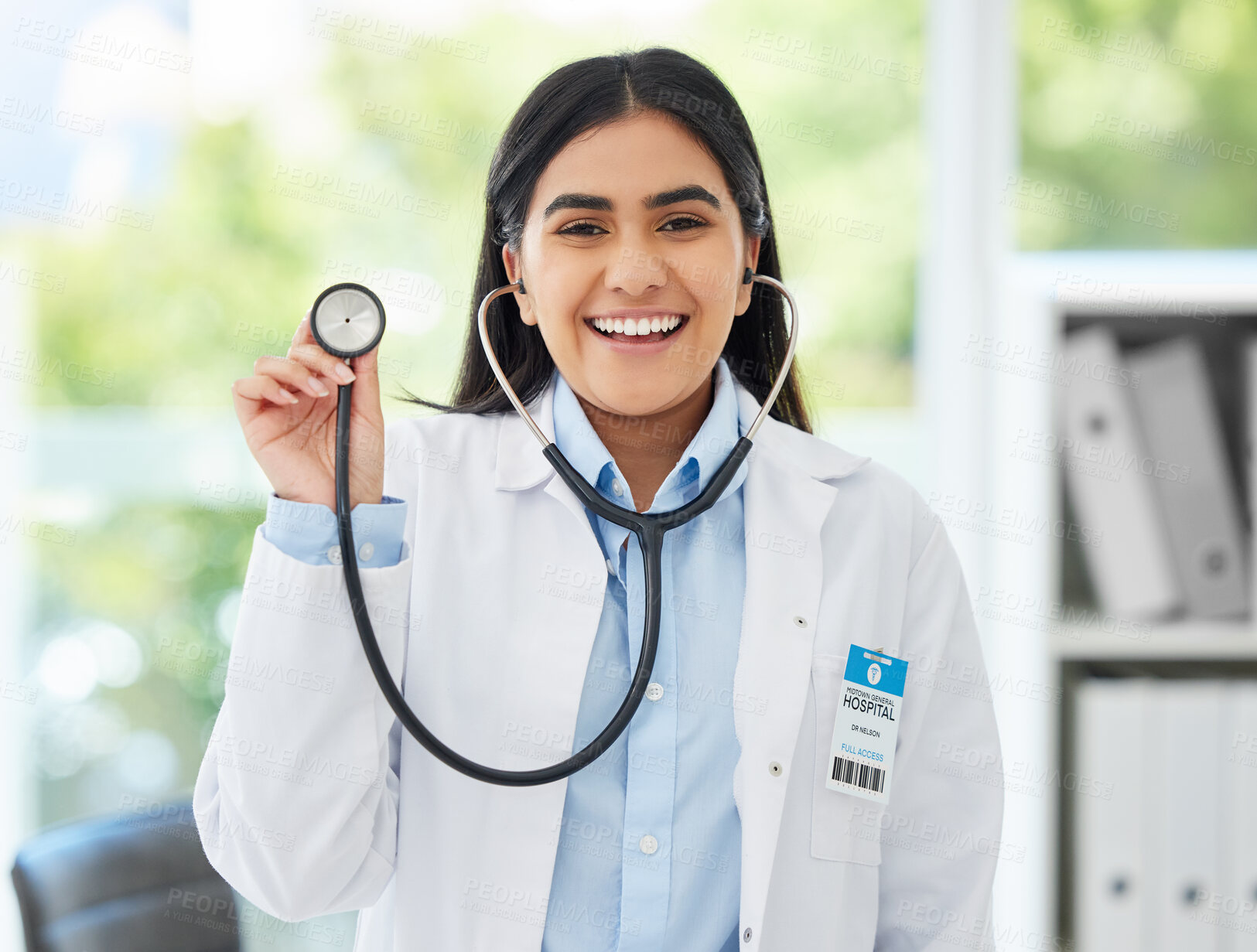 Buy stock photo Healthcare, medicine and a happy doctor, woman in her office with a smile and a stethoscope. Vision, success and empowerment, portrait of a female medical professional or health care employee at work