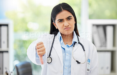 Buy stock photo Doctor, stop and thumbs down with medical healthcare professional in hospital consulting office. Fail, poor research, or bad news with pharmacist, psychologist or medicine technician