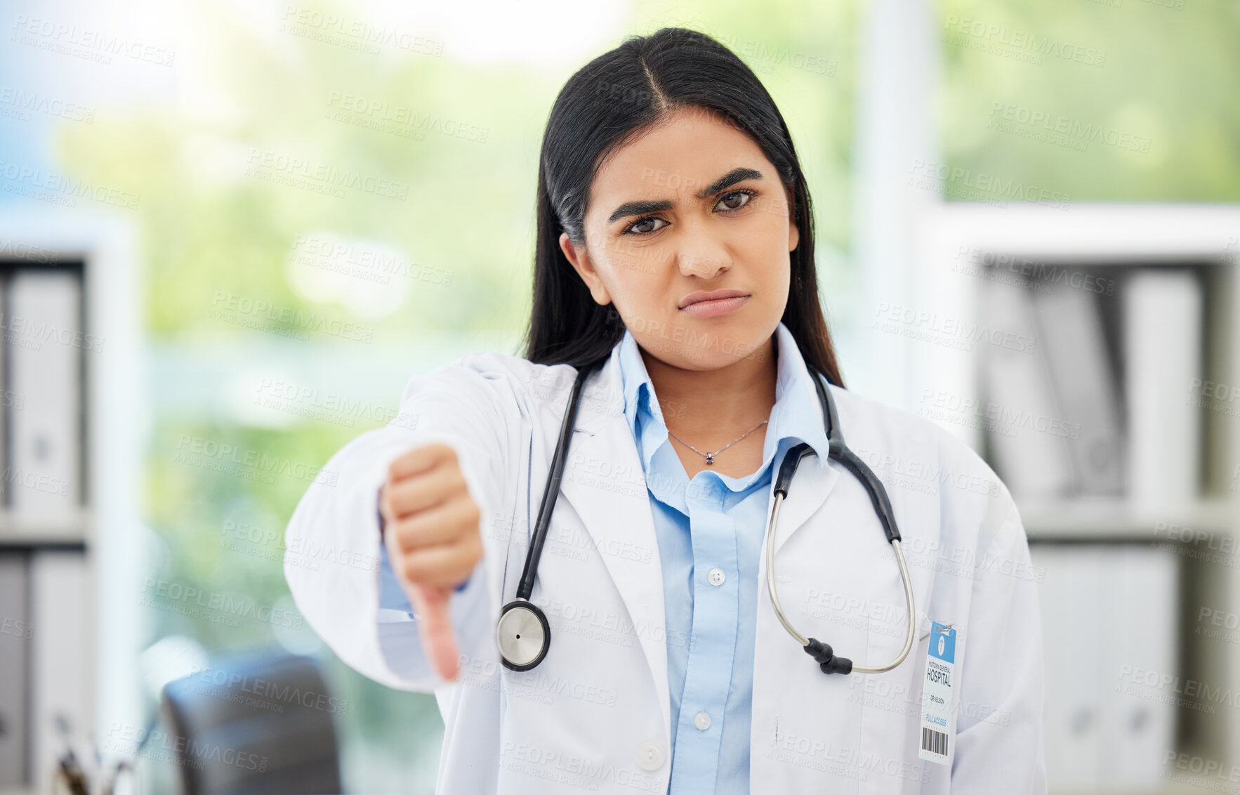 Buy stock photo Doctor, stop and thumbs down with medical healthcare professional in hospital consulting office. Fail, poor research, or bad news with pharmacist, psychologist or medicine technician