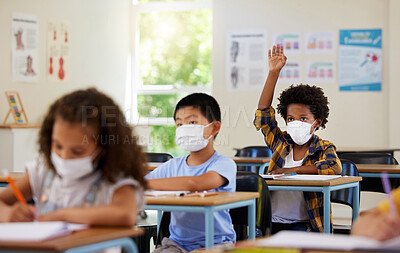 Buy stock photo Covid, students and education children in school classroom raising hand to answer, ask or question lesson with classmates. Diverse group of kids, boys or girls with face masks learning in study class