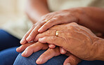 Couple holding hands for support and love, gratitude for help and support and kindness in retirement in home. Elderly friends or senior people with respect, community and hope in marriage