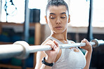 Workout, fitness and exercise woman with barbell in gym for health, cardio and wellness. Healthy, strength and sports bodybuilder or athlete training for weight lifting and muscle power competition.