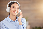 Headphone, happy girl and music or podcast online streaming to relax at work, office or startup company. Business woman, employee listening to relaxing song or audio books for stress while on break