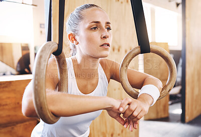 Buy stock photo Relax, gym and girl with workout ring taking a break to rest after physical activity for wellness. Tired and exhausted woman training with for core, arm and strength in body muscles.