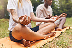 Park yoga meditation, zen and mudra hands gesture in lotus pose for nature exercise and workout. Calm energy, healthy and focus people with legs crossed training for peace, wellness balance and relax