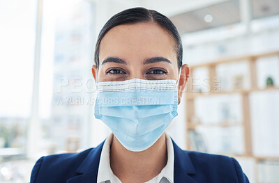 Buy stock photo Safety, compliance and face mask covid regulations at work with a young employee in an office. Corporate professional smiling and looking positive, enjoying her career and hygiene at the workplace 