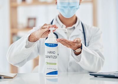 Buy stock photo Covid, hand sanitizer and hygiene with doctor, pharmacist or medical healthcare professional with a face mask. Health, insurance and consulting in hospital, clinic or office with expert behind desk