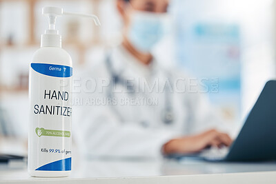 Buy stock photo Covid, doctor and hand sanitizer or hygiene bottle on counter top, table or desk of medical healthcare hospital or clinic. Bacteria, medicine and safety with health pharmacist and virus pandemic