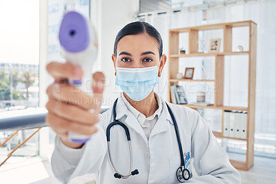 Buy stock photo Covid doctor thermometer, safety check and corona virus risk in hospital, clinic and medical surgery. Portrait of healthcare worker consulting with face mask, wellness service test and fever laser