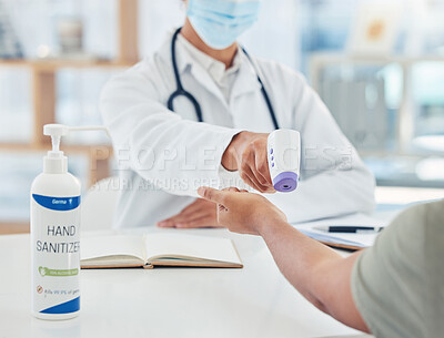 Buy stock photo Covid, doctor and thermometer for a safety hygiene check with a patient during corona virus in hospital. Closeup hands of healthcare workers doing wellness service test for fever during consultation