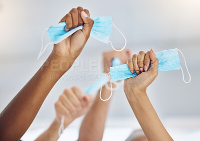Buy stock photo Celebration of end of covid pandemic with hands holding face mask in work office, success and solidarity after covid 19 and workplace happiness. Business people and employees celebrate freedom