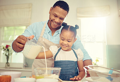 Buy stock photo Father teaching girl to bake and make dough in a messy kitchen. Caring parent and little daughter baking together in home while pouring milk into a bowl while having fun and bonding together.
