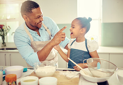 Buy stock photo Baking dad, funny daughter and flour nose messy joke from happy learning, laughing child development and bonding in kitchen. Parent, kids and family home with cute, playful and sweet comedy together