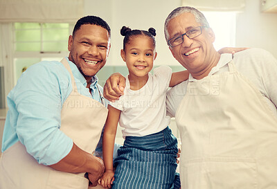 Buy stock photo Portrait of happy family after cooking or baking in a kitchen together in a house. Father, grandpa and girl bonding with a smile, happiness and love during  sweet and loving moments in kitchen