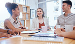 Team collaboration. research, discussing and marketing data while planning strategy in startup agency. Group of business people sharing ideas together around a table in a marketing office boardroom