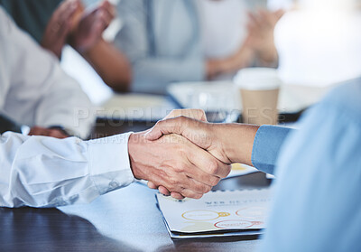 Buy stock photo Businessman shaking hands with his partner to make a corporate deal at meeting in the office. Closeup of professional employees greeting with handshake at company conference, tradeshow or convention.