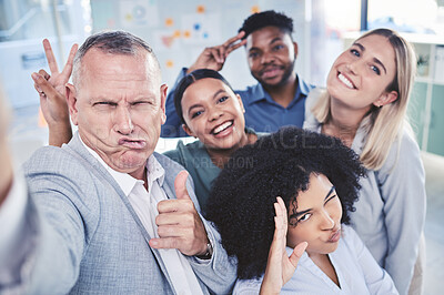 Buy stock photo Creative, fun and business team taking a selfie together while in a corporate office. Happy employee friends taking a silly, funny and comic work picture in the company conference room.