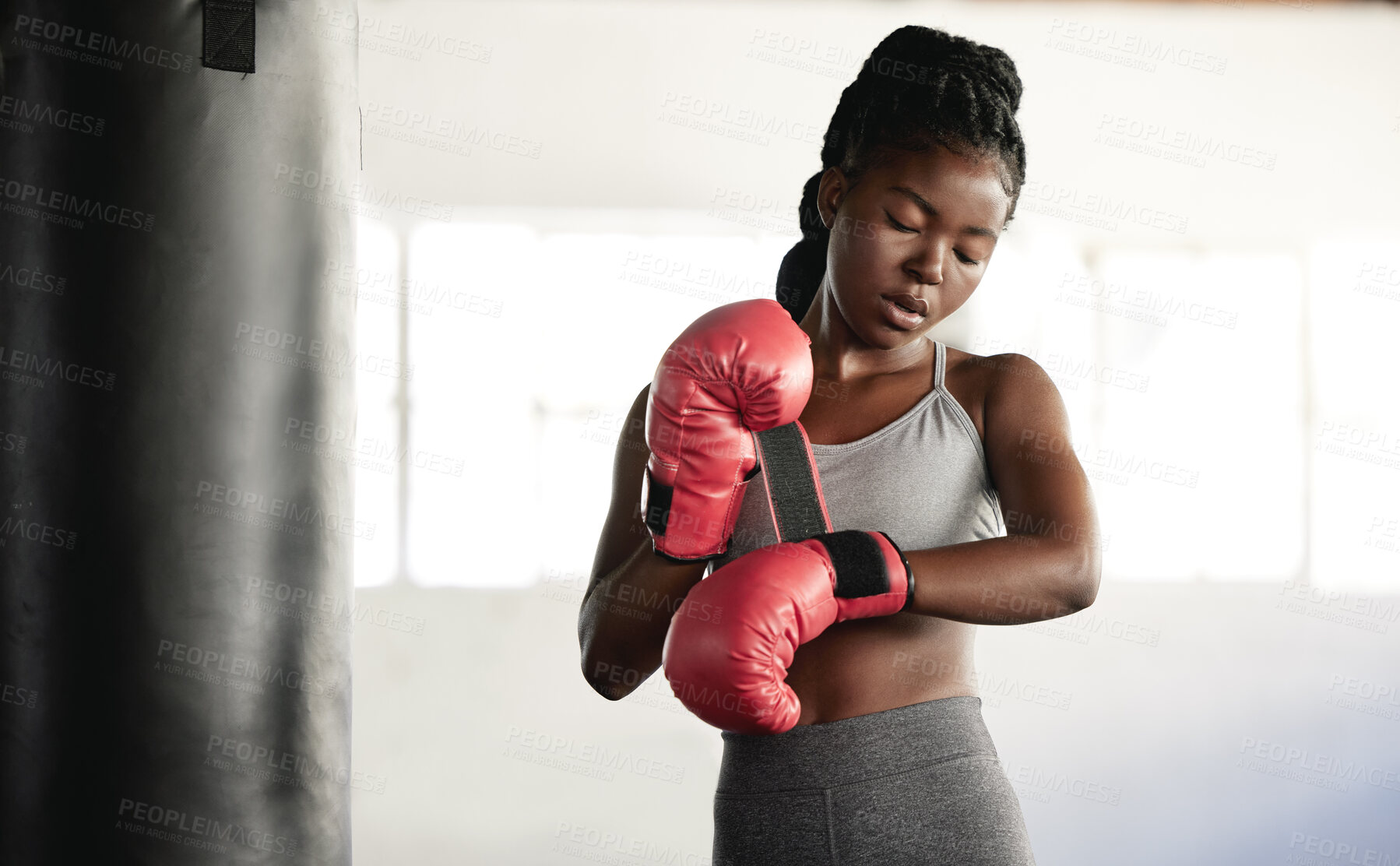 Buy stock photo Healthy, fitness and cardio woman boxer thinking about a fight, competition or match in the gym or health club. Young athlete training, exercise and workout in a fitness studio and sport motivation 
