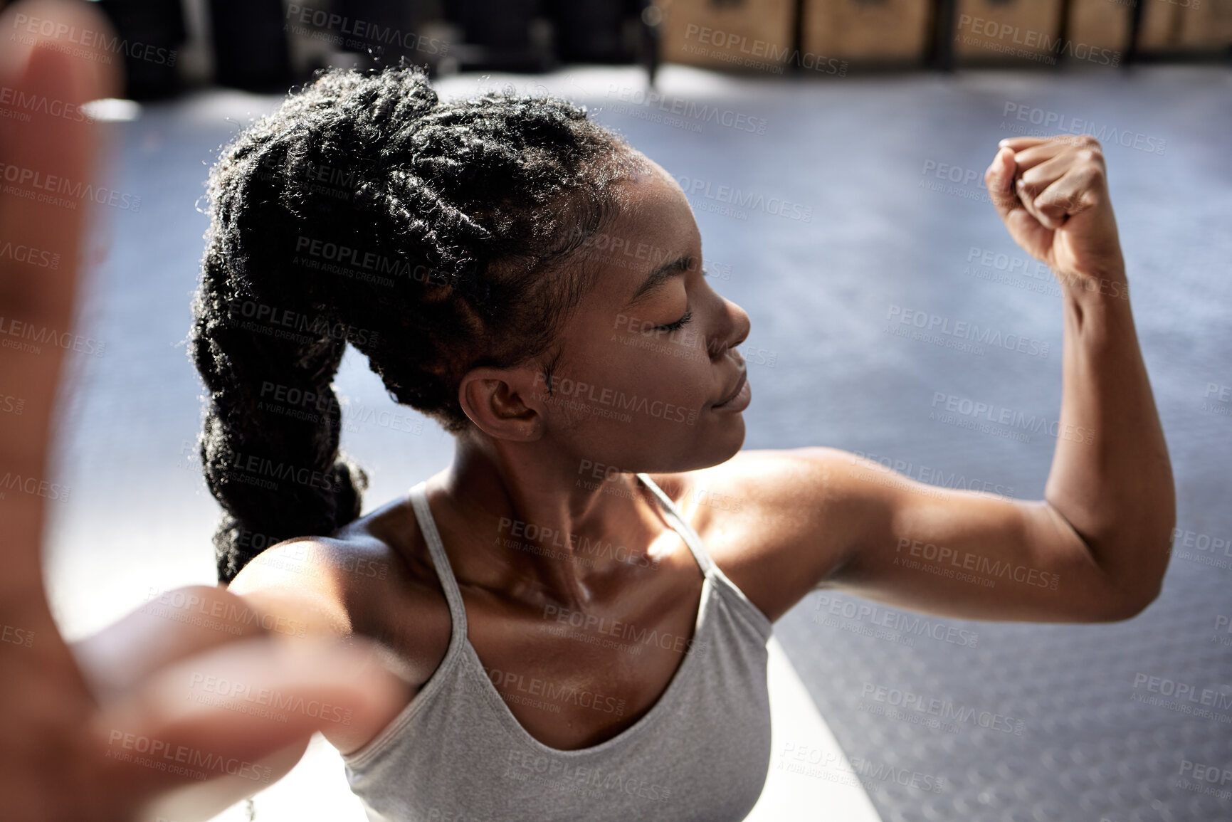 Buy stock photo Fitness, selfie and black woman with strong muscles at the gym training, exercise and workout motivation, portrait. Healthy, wellness and young athlete with powerful body, arms and muscular biceps