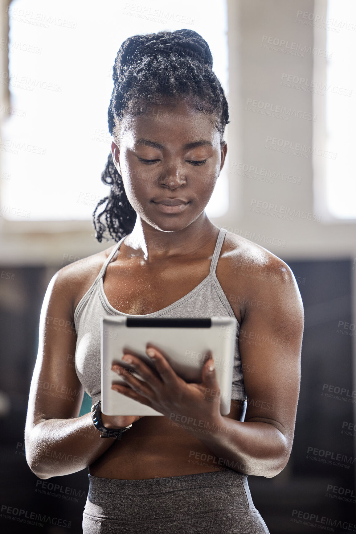 Buy stock photo Personal trainer with digital tablet, mobile wellness technology in gym and black woman exercise in fitness gym. Sports athlete online, workout coach and internet training motivation