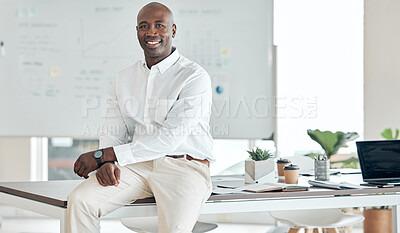 Buy stock photo Black business man, leader and office in happy, proud and confident success for company goals in the corporate workplace. African guy in success at desk with smile in management and leadership work