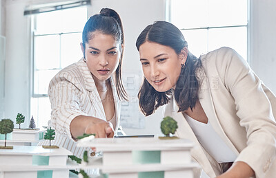 Buy stock photo Architect, team and engineer meeting while women discuss 3d architectural model vision. Teamwork and collaboration while talking and planning construction building prototype design project in office