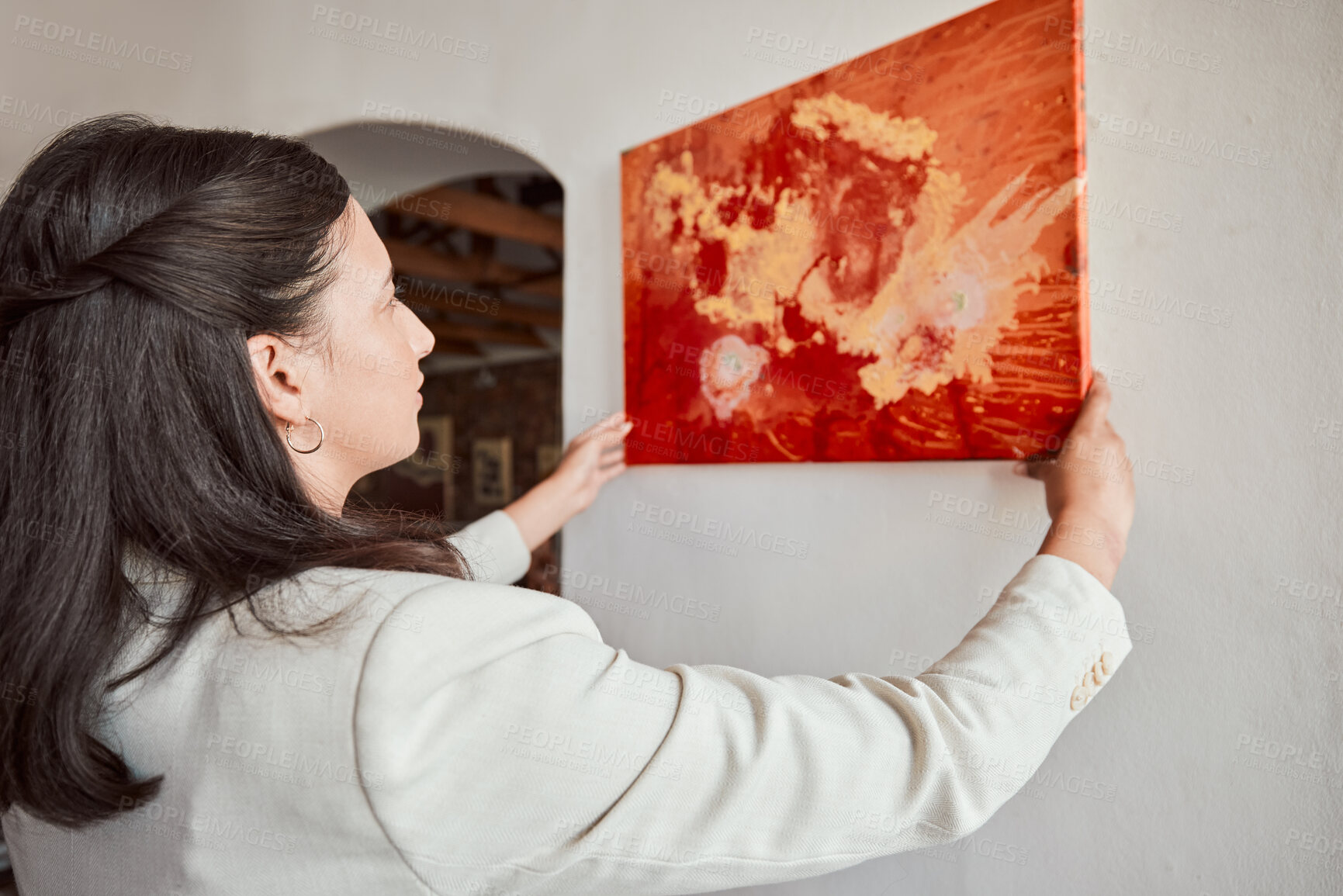 Buy stock photo Interior design, woman and wall painting in house, home and real estate sale building. Latino employee with creative vision for stage property, designer expo or art gallery exhibition in museum room