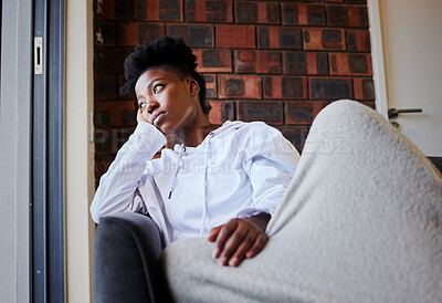 Buy stock photo Depression, mental health and sad student or girl home from university and depressed over failure in school. Black woman on house living room sofa with stress or anxiety from college scholarship loss