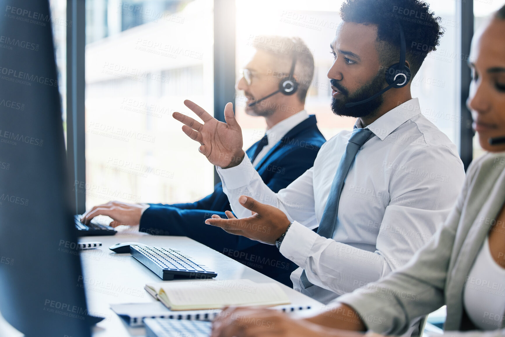 Buy stock photo Call center, customer care and support with a man consultant in a headset working on a computer in his office. Contact us, crm and telemarketing with a male consulting on a call at his work desk