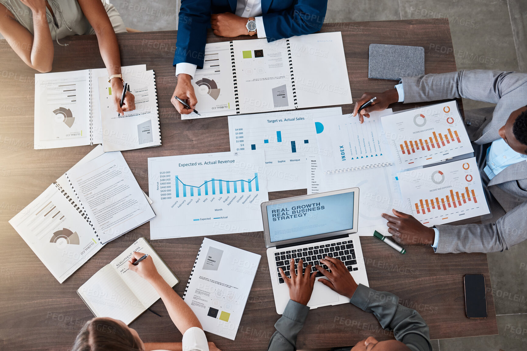 Buy stock photo Meeting, planning and finance with a team of business people discussing a report, contract or paper document. Above teamwork or conversation in boardroom meeting for strategy, growth and development
