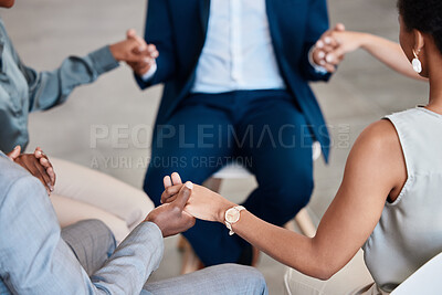 Buy stock photo Support, trust and collaboration with a group of business people holding hands while sitting in circle for a team building workshop. Pray, motivation and diversity in a corporate office or workplace