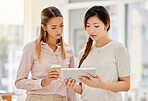 Business woman with digital tablet support, collaboration and teamwork while planning a strategy in an advertising office. Corporate women share idea while searching social media on app together