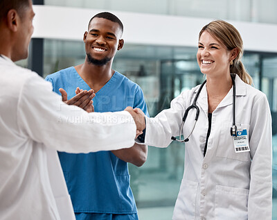 Buy stock photo Handshake with doctors at a hospital, clinic or medical facility for good job, success or approval. Healthcare, health and thank you, shaking hands or clapping, congratulations or welcome onboard.

