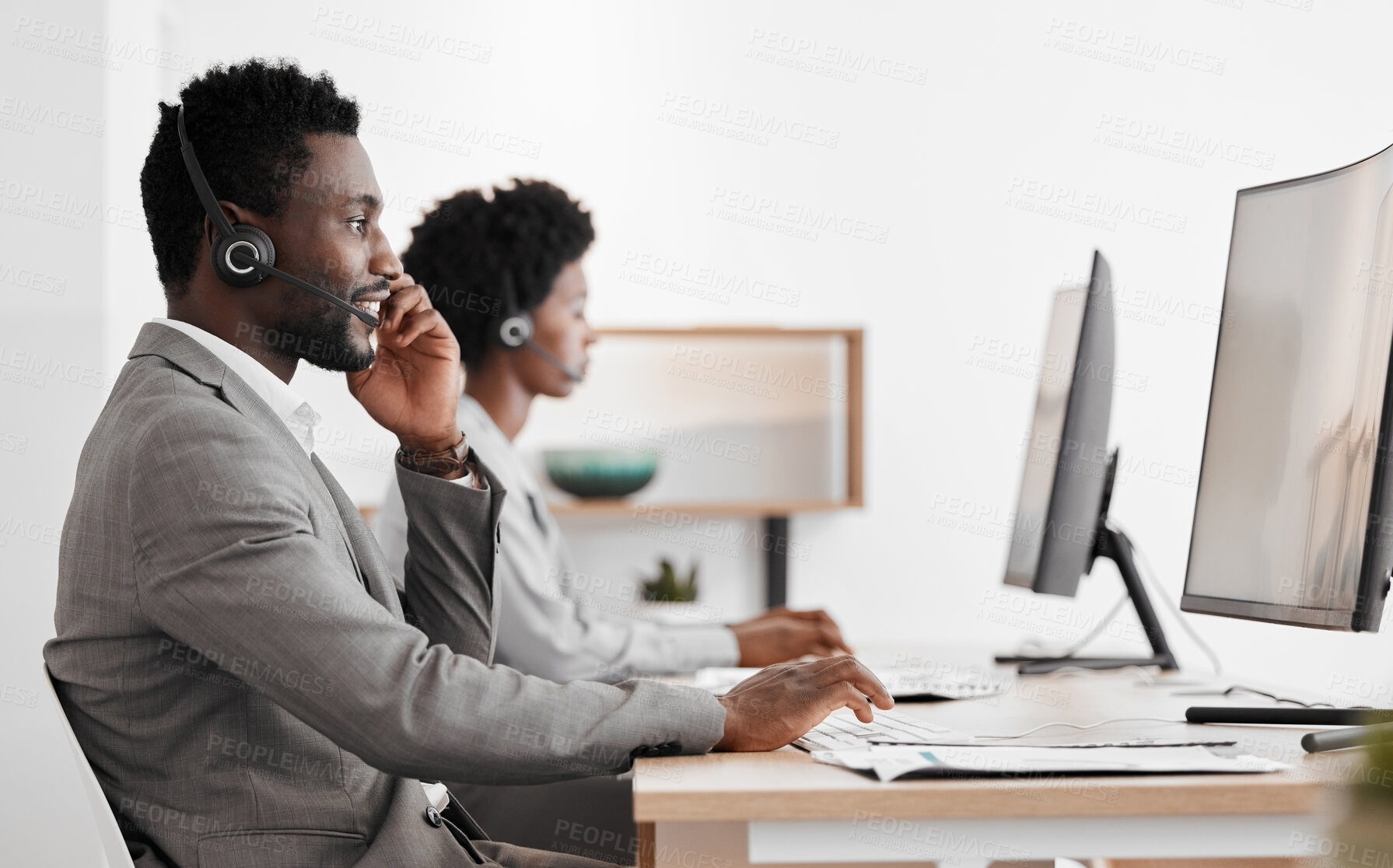 Buy stock photo Support, consulting and a black man and woman in call center with headset and computer, help in customer service. Crm, telemarketing and sales for corporate communication employee talking on phone.