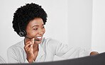 Call center consultant in communication online on computer, consulting with people on the internet and support in customer care job at telemarketing company. Happy African receptionist on phone call