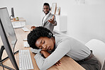 Tired call center worker sleeping at desk, burnout from working at telemarketing company and stress from consulting with people online on computer. Customer service employee with sleep problem