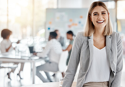 Buy stock photo Portrait of a happy business manager and boss of a creative team of startup advertising designers. Proud, smiling businesswoman or leader feeling confident and happiness while working in the office