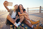 Selfie of young skater friends with phone smile and laugh at the beach. Cool cheerful man and woman smiling and having fun on the weekend. Happy couple with rollerskate having fun together outside 