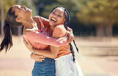 Buy stock photo Happy friends or women hug and laugh together in nature at a park or forest. Smiling, playful sisters embracing, bonding, enjoying a day outdoor and showing affection and appreciation in the woods