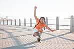 Fashion black woman, roller skating or fun by beach, sea or ocean brick street in Miami, Florida. Portrait of smile, happy or playful student with trend, style or cool clothes in freedom sports stunt
