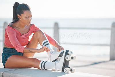 Buy stock photo Fitness, exercise and happy woman roller skating along a beach on a sunny day, content while prepare for workout outdoors. Active female enjoying free time with hobby, exercising and cardio with fun