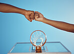Hands of basketball friends or team fist bump at game training and practice match at basketball court. Competitive athlete people in unity, solidarity and union play together sports hobby for fitness