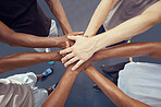 Teamwork, solidarity and diversity sports people hands stacked together from above. Athlete group or community accountability with goal, motivation or team collaboration, trust and fitness mission
