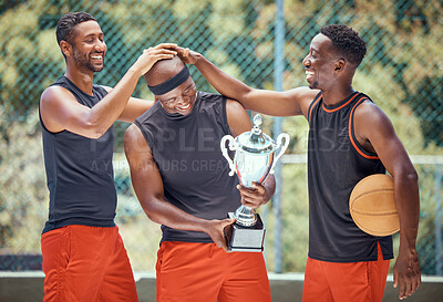 Buy stock photo Basketball game, team sports and trophy winner in sport competition on court, collaboration for winning and teamwork for success in event. African athlete celebrate prize and champion achievement