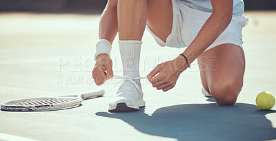 Buy stock photo Tennis sports athlete tie shoes to prepare for exercise, fitness or competition training on tennis court. Player or man hands tying shoelaces ready for game, tournament or health performance workout