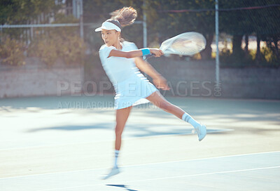 Buy stock photo Tennis, action and active woman athlete playing sports, fitness and workout on game court. Training, motion and professional tennis player using racket to hit ball in competition match