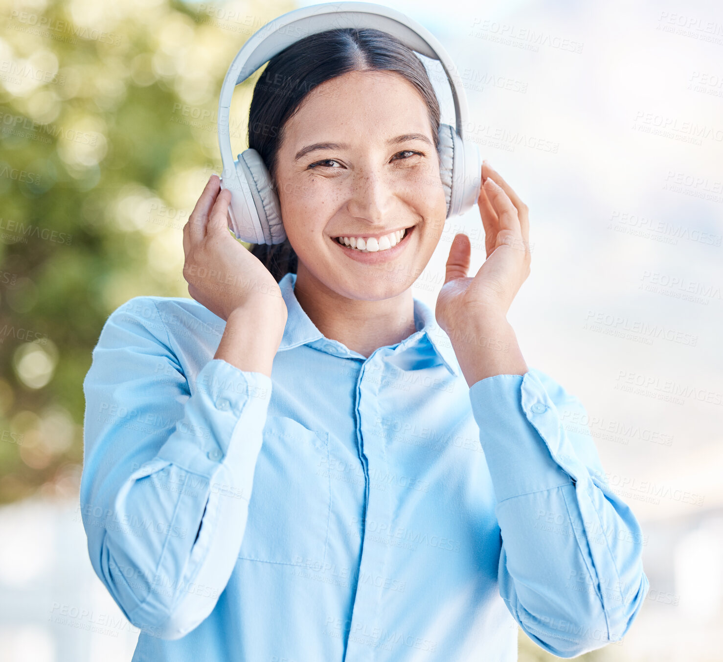 Buy stock photo Music, listening and headphones with a woman using bluetooth to listen to a podcast, radio or audio outside with a smile. Portrait of a happy young female streaming with a subscription service