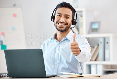 Buy stock photo Thumbs up, call center and customer service with a man saying thank you and working in sales or telemarketing. Crm, contact us and consulting with a male consultant giving a yes gesture in an office